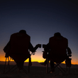 Load image into Gallery viewer, KapiK1 Expedition Co | Image of Co-Founders Ray Zahab and Stefano Gregoretti enjoying coffee after a long day exploring the desert.