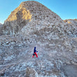 Load image into Gallery viewer, KapiK1 Expedition Co | The sun rises over the salt mountains also known as Cordillera de la Sal as KapiK1 Co-Founder Ray Zahab explores new terrain in the Atacama Desert.