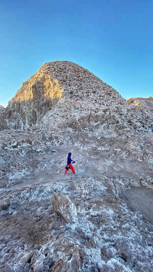 KapiK1 Expedition Co | The sun rises over the salt mountains also known as Cordillera de la Sal as KapiK1 Co-Founder Ray Zahab explores new terrain in the Atacama Desert.  